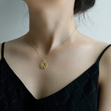 World map golden necklace