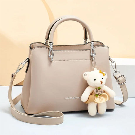 Stylish Beige Handbag: Wide Capacity, Cute Bear Pendant, Fashionable Charm - Shop N Save