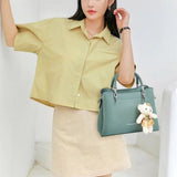 Green Stylish Handbag: Cute Pendant, Double Handles, Fashionable Charm