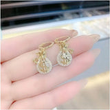 Dollar Sign Money Bag Earrings: Lucky Jewelry for Women &amp; Girls - Shop N Save