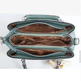Green Stylish Handbag: Cute Pendant, Double Handles, Fashionable Charm