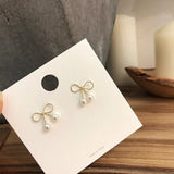 Metal Bow Pearl Earrings - Southeast Korean Fashion 2023 - Shop N Save